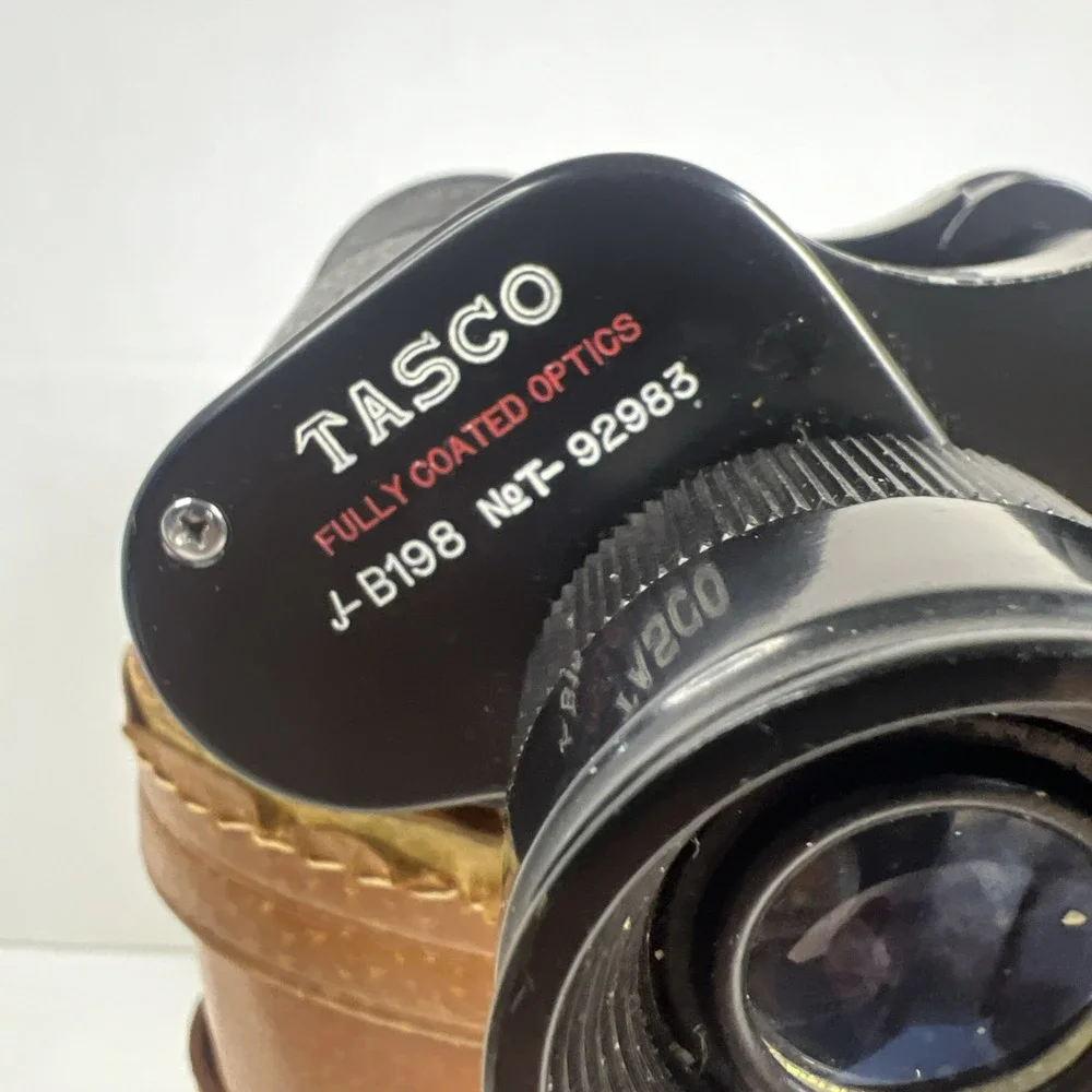 Vintage 50s-60s Tasco binoculars featuring 